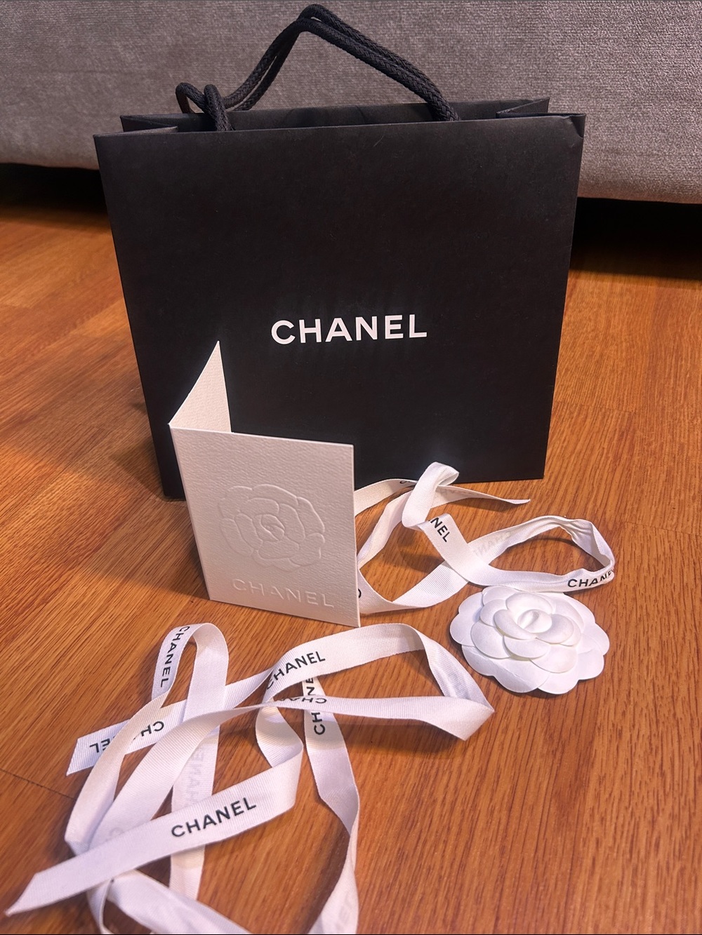 CHANEL Black Gift Bag with White Camellia & Branded Ribbon